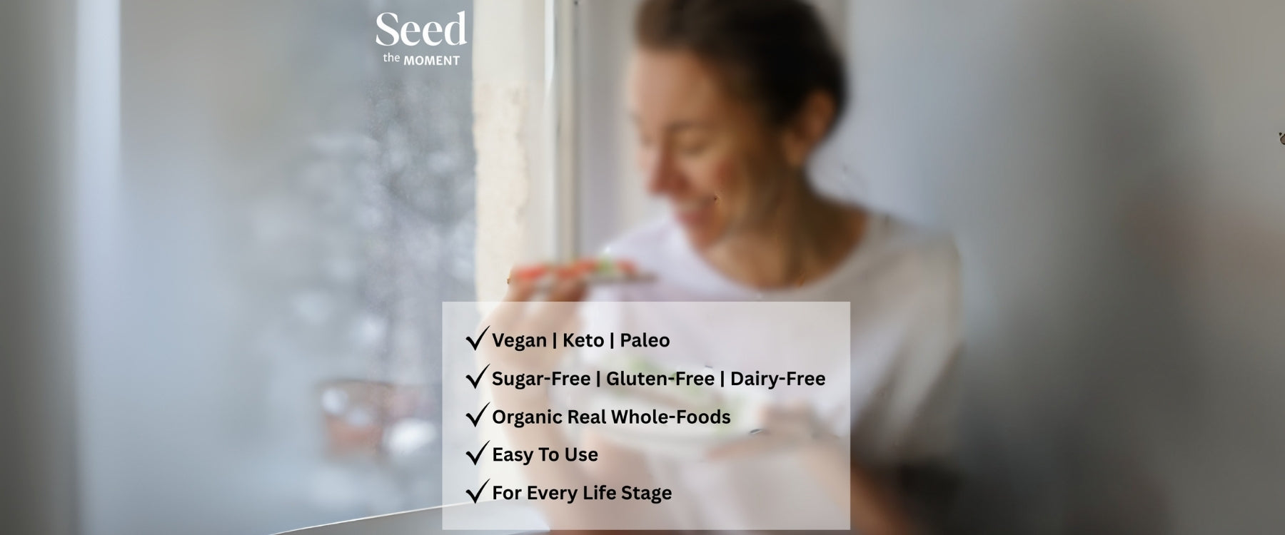 Woman eating avocado toast with seed the moment blends and product features listed on a blurred background